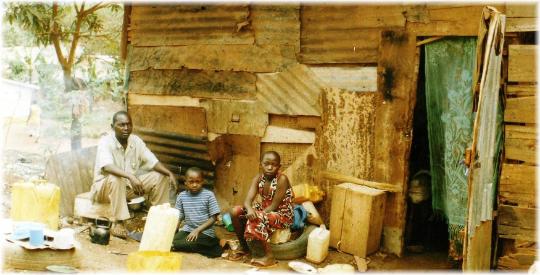 Japheth, Sharon, and Christine at their former home
